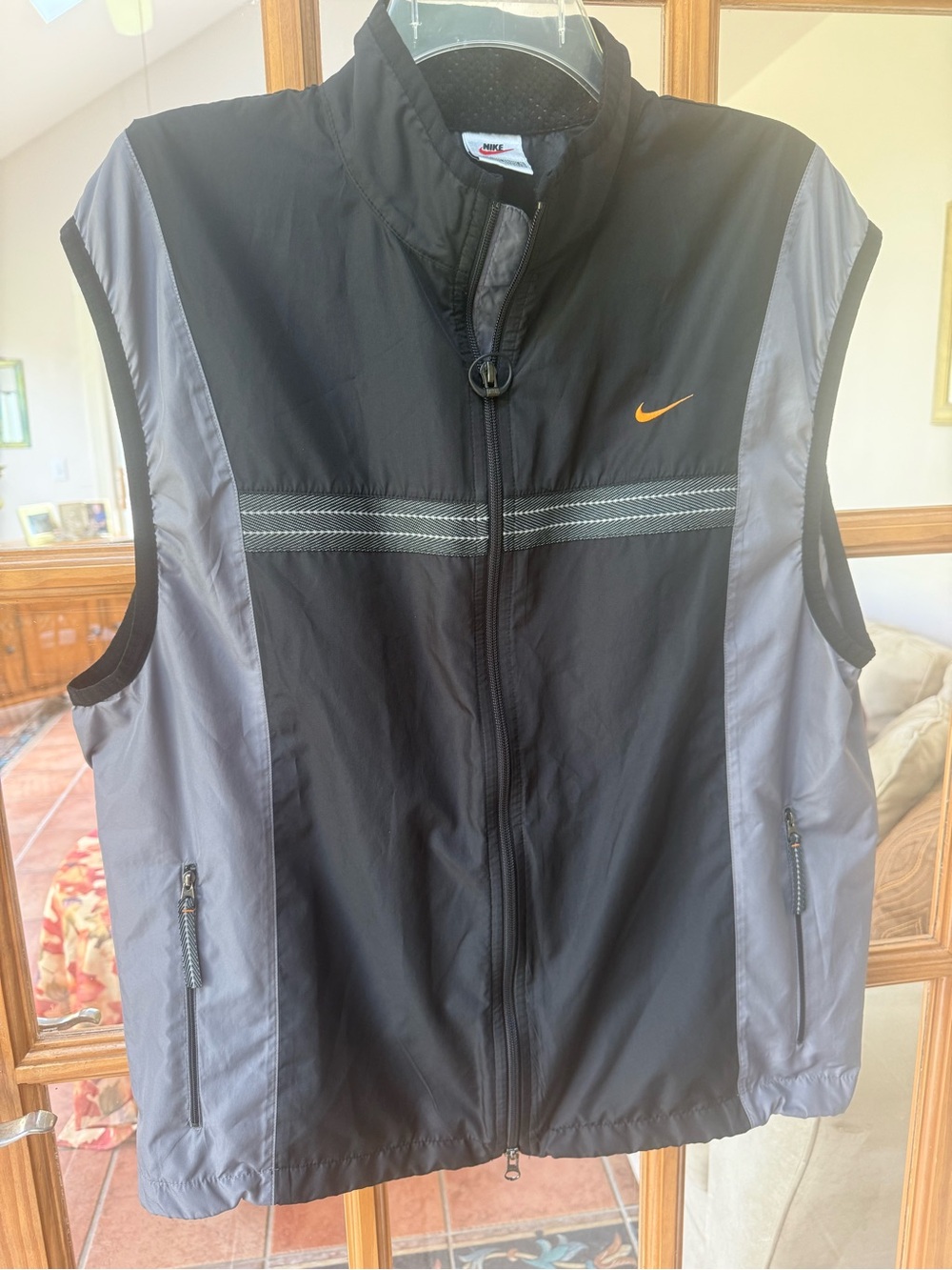 Nike Black & Gray Sleeveless Wind Vest with Orange Swoosh